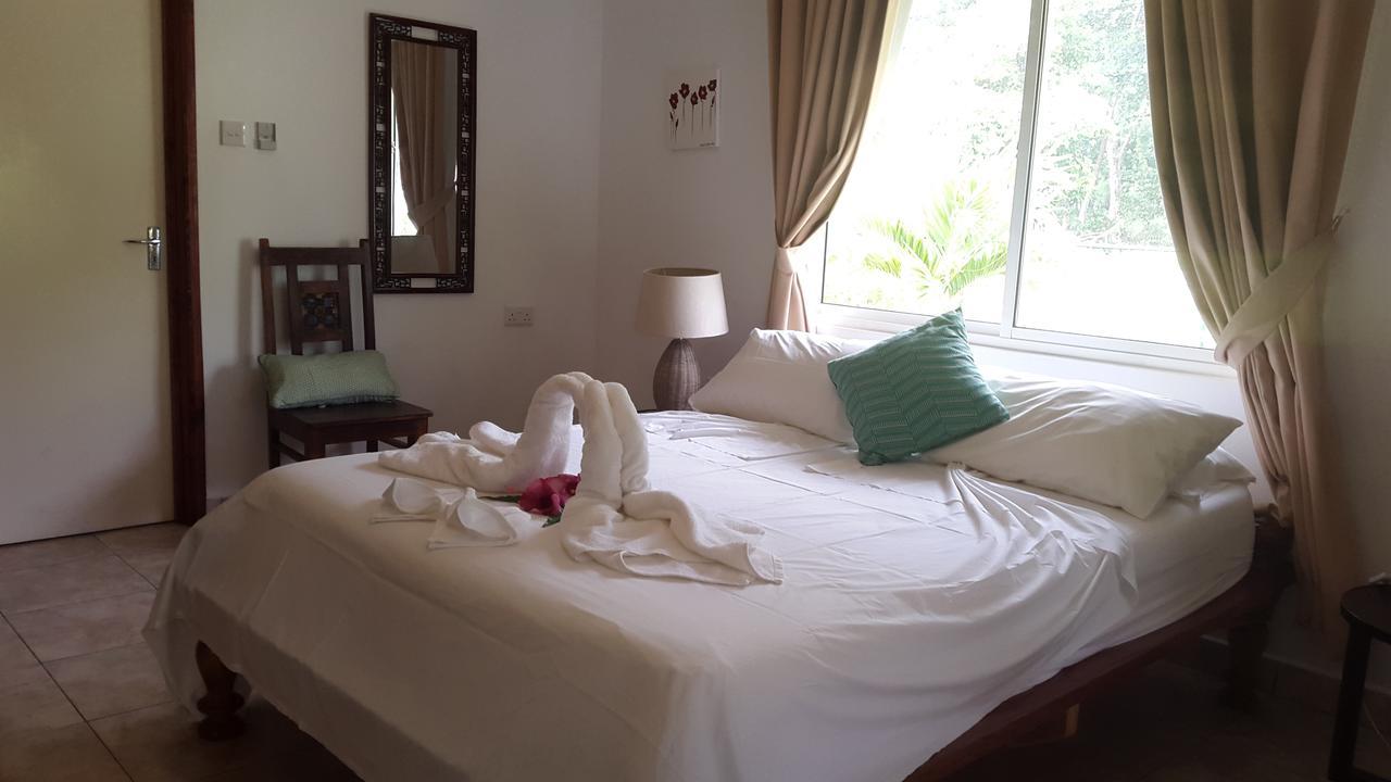 Paodise Guesthouse Диг Стая снимка